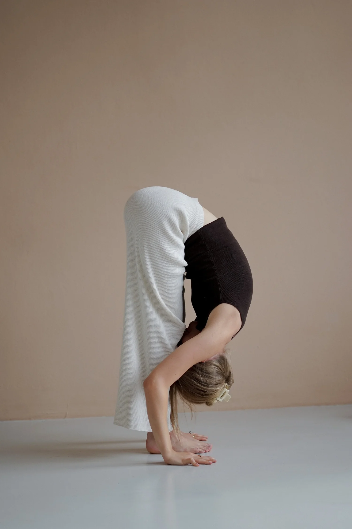 Matthäa folding forward in a Yin Yoga practice